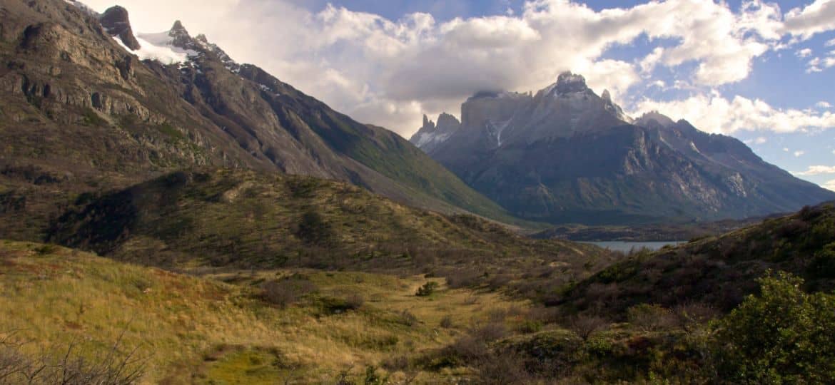 Beautiful scenery of mountains under the cloudy sky in Torres del Paine National Park, Chile
